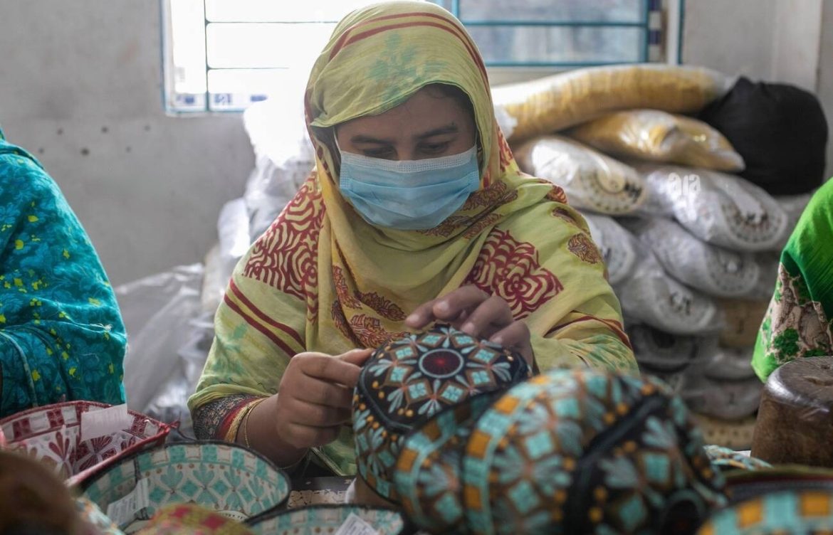 Women earn self-reliance with hand-knitted Muslim prayer caps